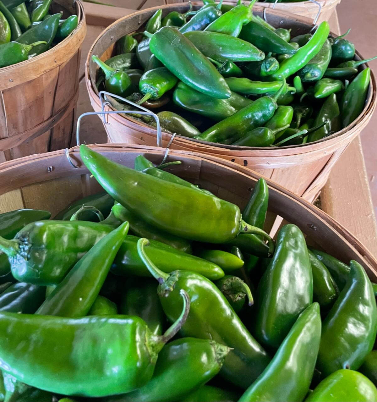 Wooden baskets filled with jalapeno peppers